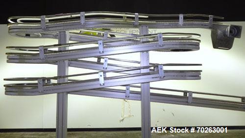Used Flexlink Alpine XL 63 mm Buffer Vertical J Shape Chain Conveyor. Top section 100" into 9" 180 degree turn into four 72" sections with four 9" 180 degree turns. Bottom section 162" long. 80" Inpu...