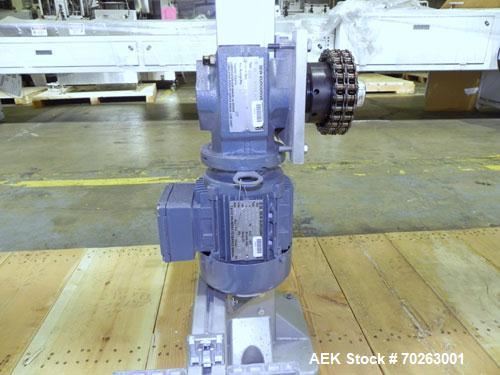 Used Flexlink Alpine XL 63 mm Buffer Vertical J Shape Chain Conveyor. Top section 100" into 9" 180 degree turn into four 72" sections with four 9" 180 degree turns. Bottom section 162" long. 80" Inpu...