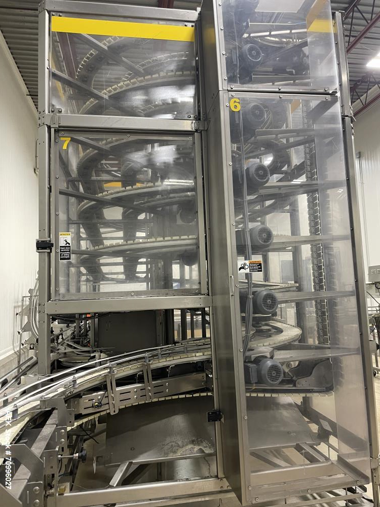 Used Used- Hartness Model Dynac 6400 Spiral First-In First-Out (FIFO) Accumulation Line for beverage containers.  Is capable of running products with a maximum product height range of 1"-11.75". 6 ti...