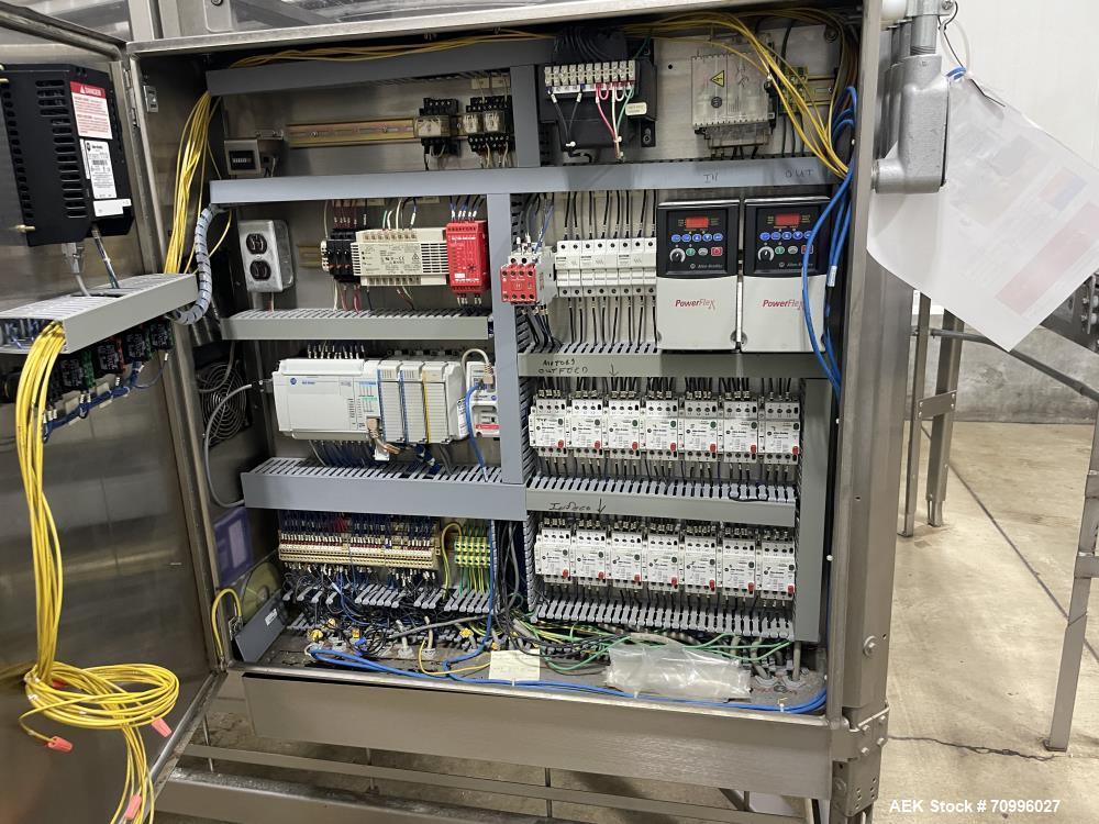 Used Used- Hartness Model Dynac 6400 Spiral First-In First-Out (FIFO) Accumulation Line for beverage containers.  Is capable of running products with a maximum product height range of 1"-11.75". 6 ti...