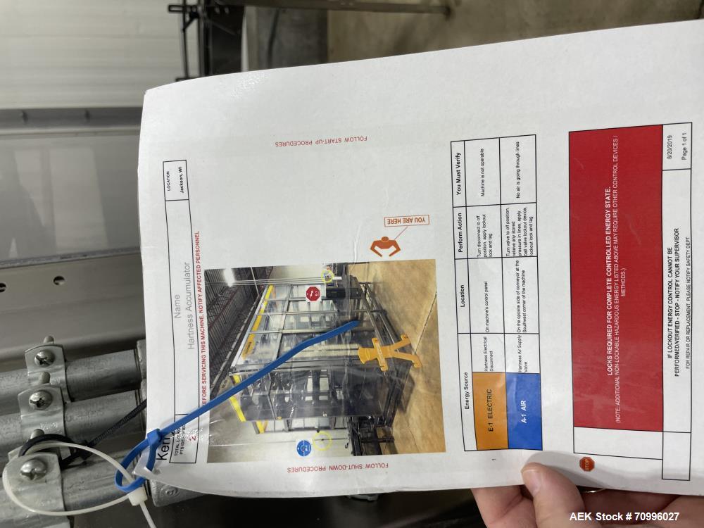 Used Used- Hartness Model Dynac 6400 Spiral First-In First-Out (FIFO) Accumulation Line for beverage containers.  Is capable of running products with a maximum product height range of 1"-11.75". 6 ti...