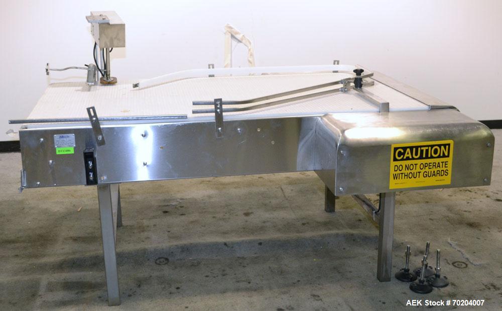 Used DT Kalish Bi-Directional Accumulation Table Model TP 01. Table has a 36" wide x 66" long accumulation area. Machine has Garvey variable speed controllers. Is of stainless steel construction. Bui...