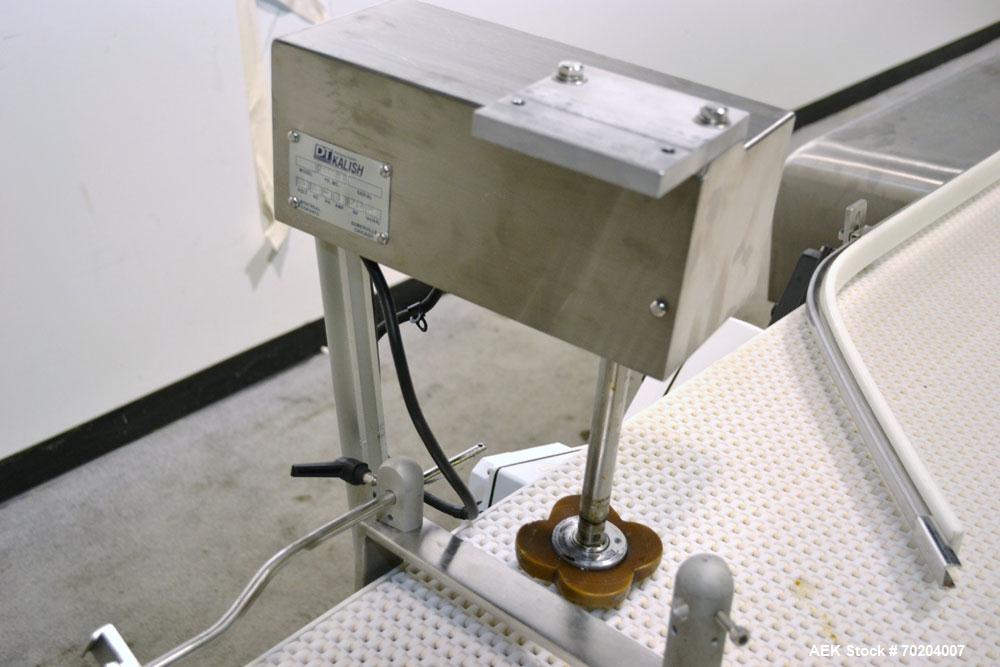 Used DT Kalish Bi-Directional Accumulation Table Model TP 01. Table has a 36" wide x 66" long accumulation area. Machine has Garvey variable speed controllers. Is of stainless steel construction. Bui...