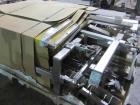 Used Hartness Model Dynac 6400Q Spiral First-In First-Out Accumulation Line