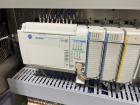 Used Used- Hartness Model Dynac 6400 Spiral First-In First-Out (FIFO) Accumulation Line for beverage containers.  Is capable of running products with a maximum product height range of 1
