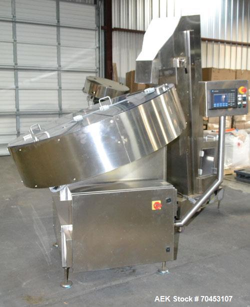 Used Ozaf AC/1500 Bottle Unscrambler, capacity approximately 170-180 units per minute. Includes an OZAF integrated elevator model E/10AG. SELLING PRICE AS IS, WHERE IS, SANFORD, NC.