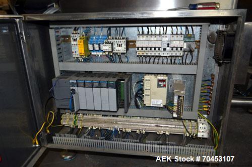 Used Ozaf AC/1500 Bottle Unscrambler, capacity approximately 170-180 units per minute. Includes an OZAF integrated elevator model E/10AG. SELLING PRICE AS IS, WHERE IS, SANFORD, NC.
