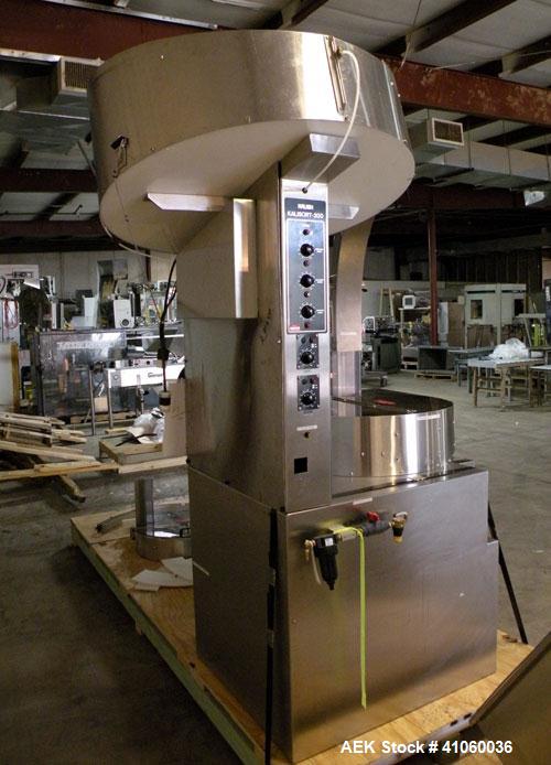 Used Kalish Kalisort-200 Bottle Orienter, Model 7430. Approximately 200 bottles per minute. Includes a starwheel, 4’’ wide x 74’’ long takeaway conveyor, and a stainless steel hopper, serial# 0012. I...