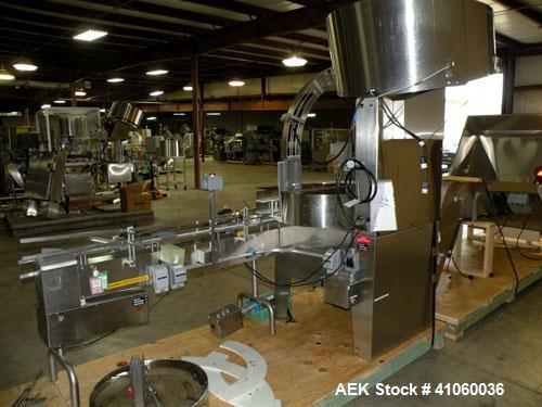 Used Kalish Kalisort-200 Bottle Orienter, Model 7430. Approximately 200 bottles per minute. Includes a starwheel, 4’’ wide x 74’’ long takeaway conveyor, and a stainless steel hopper, serial# 0012. I...