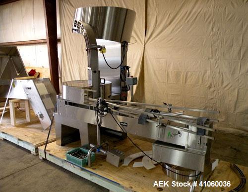 Used Kalish Kalisort-200 Bottle Orienter, Model 7430. Approximately 200 bottles per minute. Includes a starwheel, 4’’ wide x 74’’ long takeaway conveyor, and a stainless steel hopper, serial# 0012. I...