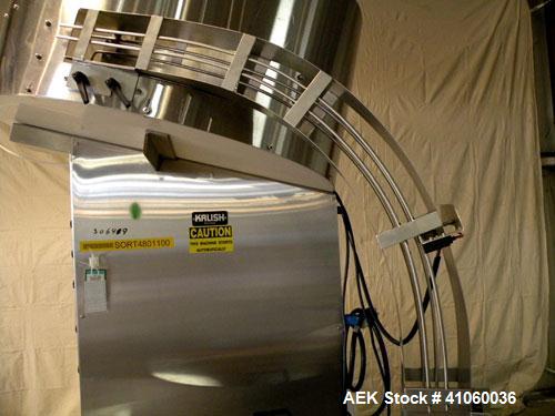 Used Kalish Kalisort-200 Bottle Orienter, Model 7430. Approximately 200 bottles per minute. Includes a starwheel, 4’’ wide x 74’’ long takeaway conveyor, and a stainless steel hopper, serial# 0012. I...