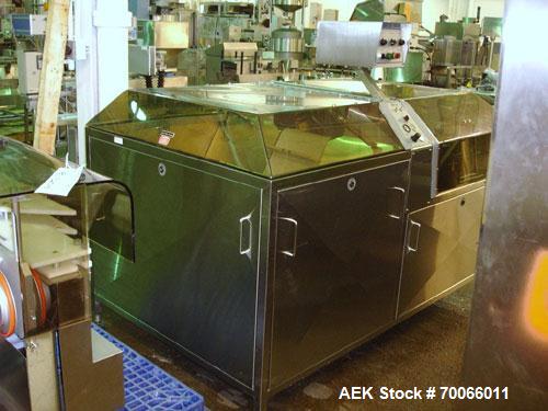 Used DT Kalish Kalisort 7400 bulk bottle unscrambler with DT Kalish model 999 inoized air cleaner bottle inverter and twin nozzle cleaning head, serial# 0001. (1) DT Kalish unscrambler, model 7400. I...