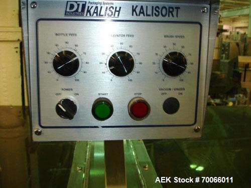 Used DT Kalish Kalisort 7400 bulk bottle unscrambler with DT Kalish model 999 inoized air cleaner bottle inverter and twin nozzle cleaning head, serial# 0001. (1) DT Kalish unscrambler, model 7400. I...