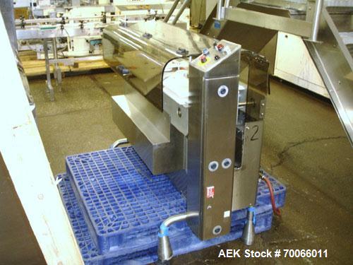 Used DT Kalish Kalisort 7400 bulk bottle unscrambler with DT Kalish model 999 inoized air cleaner bottle inverter and twin nozzle cleaning head, serial# 0001. (1) DT Kalish unscrambler, model 7400. I...