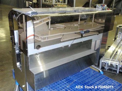 Used DT Kalish Kalisort 7400 bulk bottle unscrambler with DT Kalish model 999 inoized air cleaner bottle inverter and twin nozzle cleaning head, serial# 0001. (1) DT Kalish unscrambler, model 7400. I...