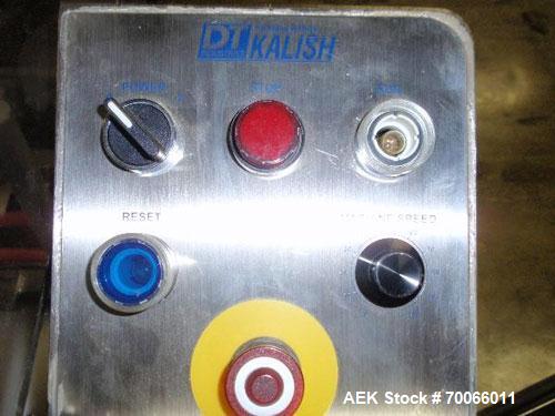 Used DT Kalish Kalisort 7400 bulk bottle unscrambler with DT Kalish model 999 inoized air cleaner bottle inverter and twin nozzle cleaning head, serial# 0001. (1) DT Kalish unscrambler, model 7400. I...