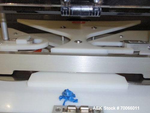 Used DT Kalish Kalisort 7400 bulk bottle unscrambler with DT Kalish model 999 inoized air cleaner bottle inverter and twin nozzle cleaning head, serial# 0001. (1) DT Kalish unscrambler, model 7400. I...