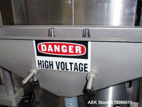 Used DT Kalish Kalisort 7400 bulk bottle unscrambler with DT Kalish model 999 inoized air cleaner bottle inverter and twin nozzle cleaning head, serial# 0001. (1) DT Kalish unscrambler, model 7400. I...
