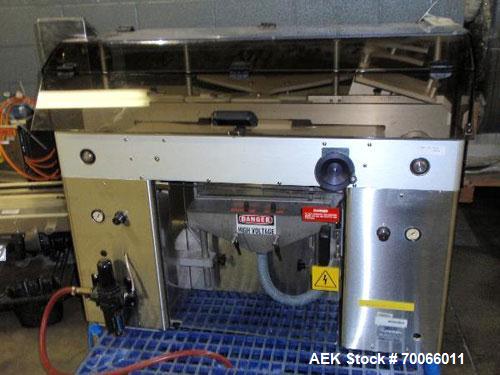 Used DT Kalish Kalisort 7400 bulk bottle unscrambler with DT Kalish model 999 inoized air cleaner bottle inverter and twin nozzle cleaning head, serial# 0001. (1) DT Kalish unscrambler, model 7400. I...