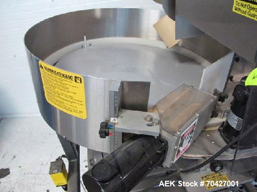 Used Kaps-All AU3 Bulk Bottle Unscrambler. Capable of speeds up to 150 bottles per minute. Bottle size range: (height) 1/2" to 6" (width) up to 3". Compact design. Has a 10 cu ft bottle hopper with a...
