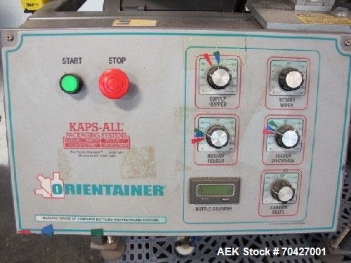 Used Kaps-All AU3 Bulk Bottle Unscrambler. Capable of speeds up to 150 bottles per minute. Bottle size range: (height) 1/2" to 6" (width) up to 3". Compact design. Has a 10 cu ft bottle hopper with a...