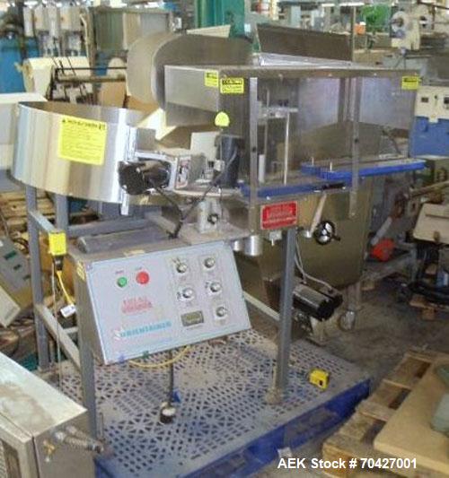 Used Kaps-All AU3 Bulk Bottle Unscrambler. Capable of speeds up to 150 bottles per minute. Bottle size range: (height) 1/2" to 6" (width) up to 3". Compact design. Has a 10 cu ft bottle hopper with a...