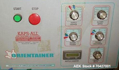 Used Kaps-All AU3 Bulk Bottle Unscrambler. Capable of speeds up to 150 bottles per minute. Bottle size range: (height) 1/2" to 6" (width) up to 3". Compact design. Has a 10 cu ft bottle hopper with a...
