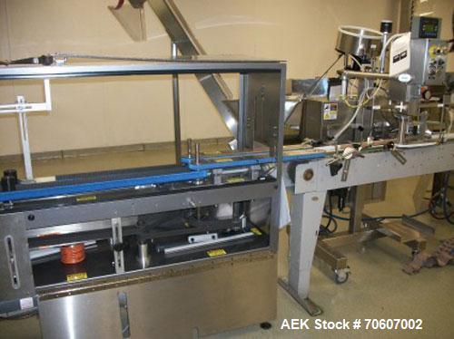 Used Kapsall Automatic Bottle Unscrambler, Model AU5C, all stainless steel. Features air cleaner, 48" hper & bow, adjustable positioning orientation bowl and elevator to accommmodate large bottles; f...
