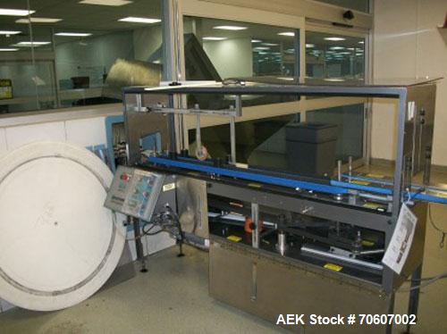 Used Kapsall Automatic Bottle Unscrambler, Model AU5C, all stainless steel. Features air cleaner, 48" hper & bow, adjustable positioning orientation bowl and elevator to accommmodate large bottles; f...