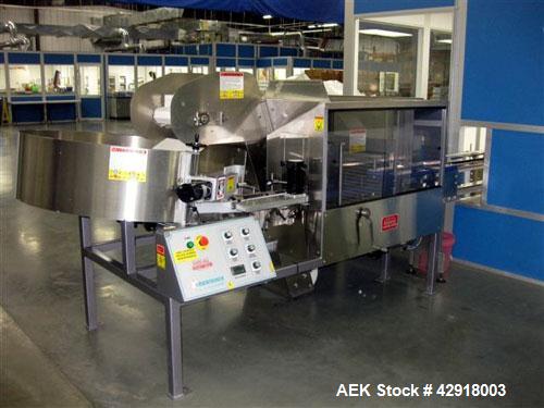 Used Kapsall Model AU6 bulk bottle unscrambler with integrated bottle elevator. Low profile design. Can Orient bottles from 1/16 oz to Gallons with proper changeparts. Last running 8/16 oz bottle wat...