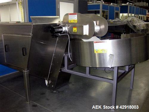 Used Kapsall Model AU6 bulk bottle unscrambler with integrated bottle elevator. Low profile design. Can Orient bottles from 1/16 oz to Gallons with proper changeparts. Last running 8/16 oz bottle wat...