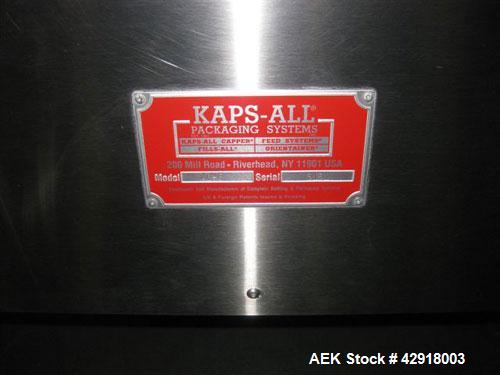 Used Kapsall Model AU6 bulk bottle unscrambler with integrated bottle elevator. Low profile design. Can Orient bottles from 1/16 oz to Gallons with proper changeparts. Last running 8/16 oz bottle wat...