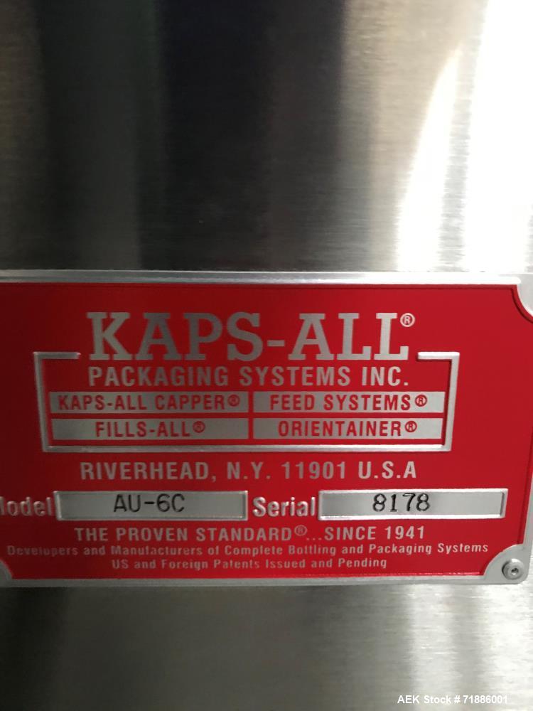 Used Kaps-All Orientainer Plastic Bottle Unscrambler, Model AU-6. Includes: 36" prefeeder, 12" elevator, 15 cubic hopper. Automatic Bottle Cleaner installed.