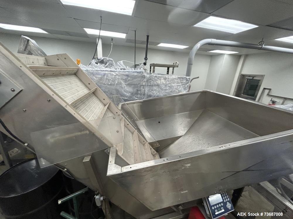 Used New England High Speed Bulk Bottle Unscrambler, Model NEHAE-60. Capable of speeds up to 400 containers per minute (depending on bottle size and configuration). Container size range: 5/8" to 6" (...