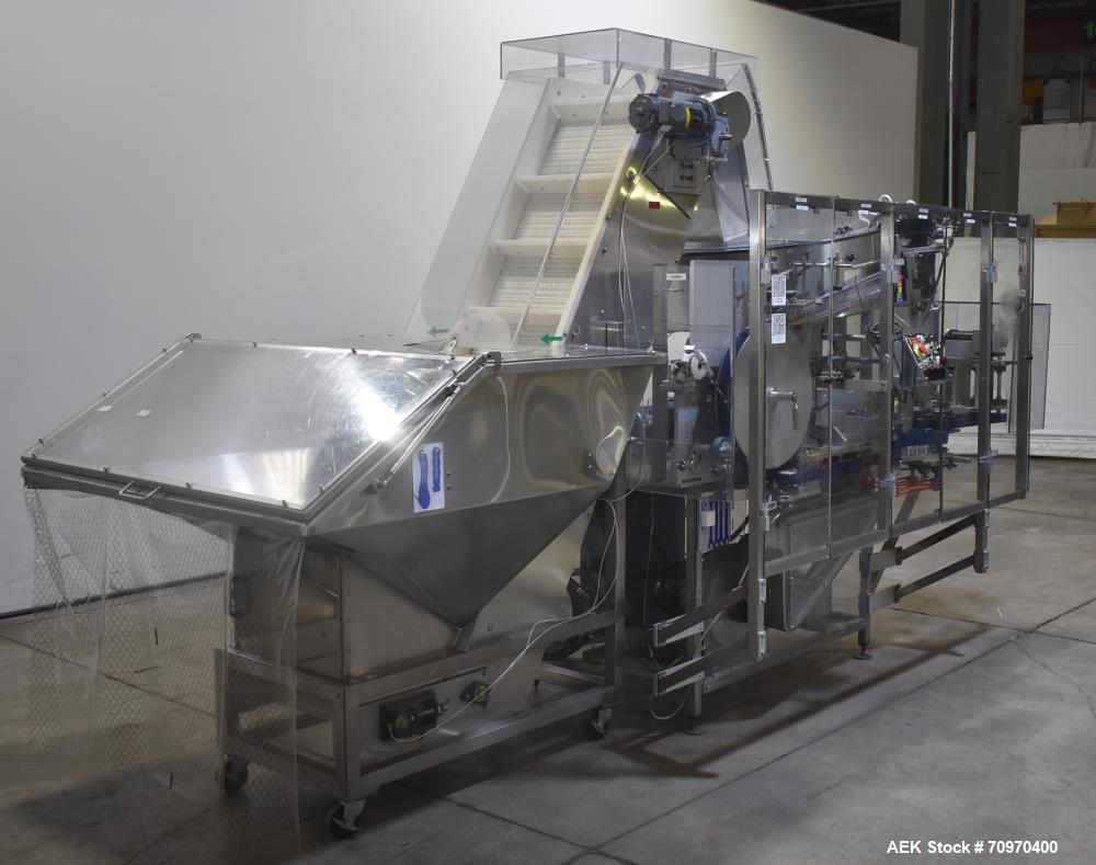 Used New England Machinery Model NEHCL-200AJ Bulk Bottle Unscrambler. Machine is capable of speeds up to 200 bottles per minute. Container size range: Diameter 5/8" - 3-1/2"; Height up to 10". Has in...