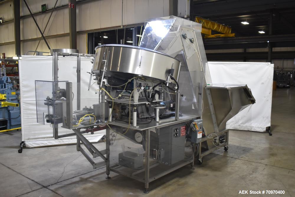 Used New England Machinery Model NEHCL-200AJ Bulk Bottle Unscrambler. Machine is capable of speeds up to 200 bottles per minute. Container size range: Diameter 5/8" - 3-1/2"; Height up to 10". Has in...