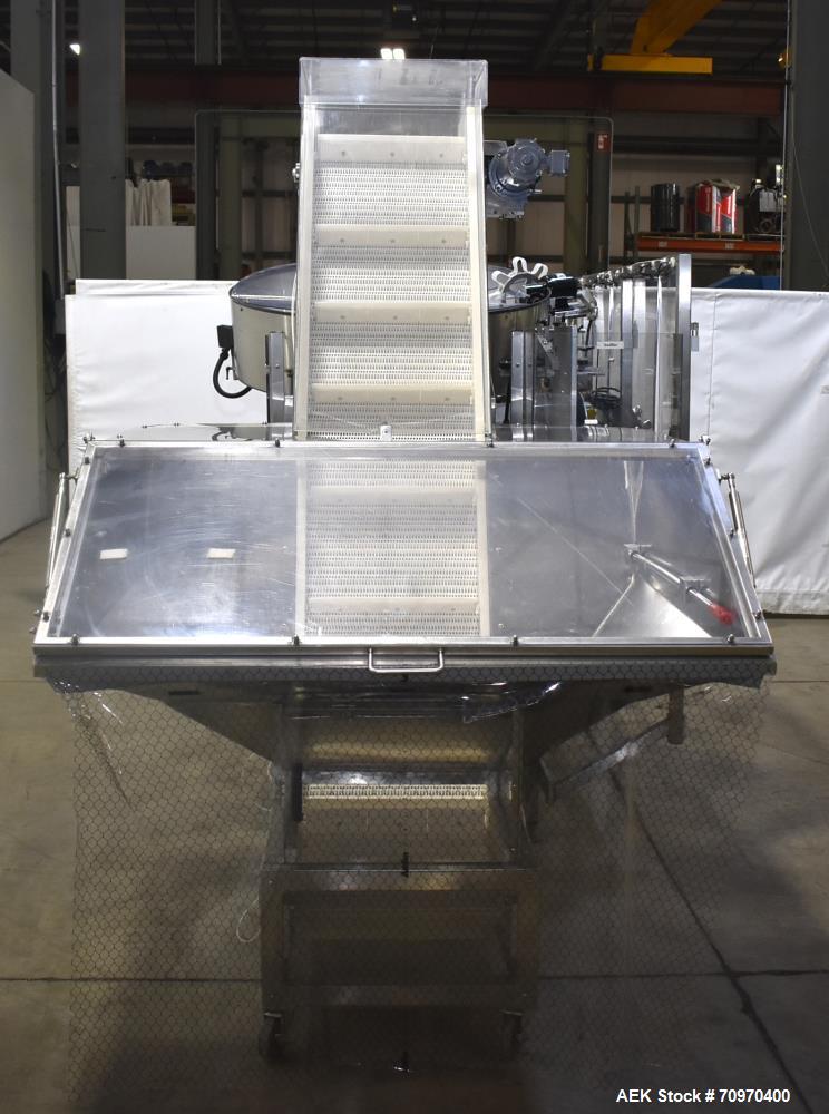 Used New England Machinery Model NEHCL-200AJ Bulk Bottle Unscrambler. Machine is capable of speeds up to 200 bottles per minute. Container size range: Diameter 5/8" - 3-1/2"; Height up to 10". Has in...