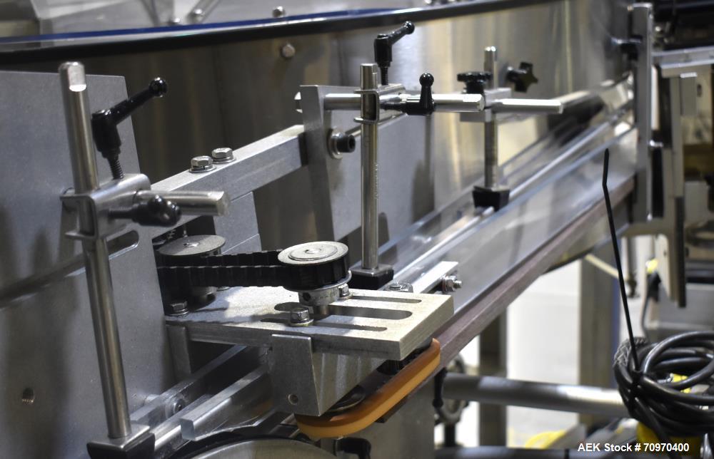 Used New England Machinery Model NEHCL-200AJ Bulk Bottle Unscrambler. Machine is capable of speeds up to 200 bottles per minute. Container size range: Diameter 5/8" - 3-1/2"; Height up to 10". Has in...