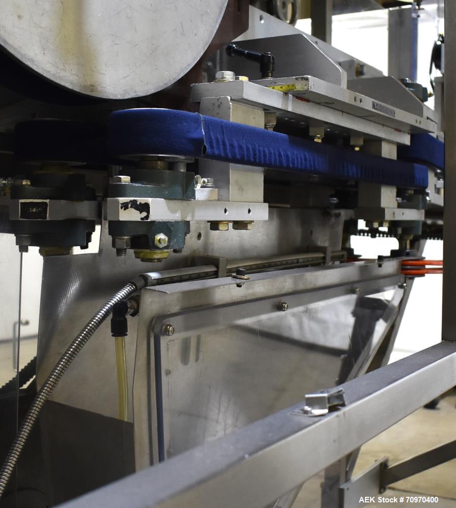 Used New England Machinery Model NEHCL-200AJ Bulk Bottle Unscrambler. Machine is capable of speeds up to 200 bottles per minute. Container size range: Diameter 5/8" - 3-1/2"; Height up to 10". Has in...