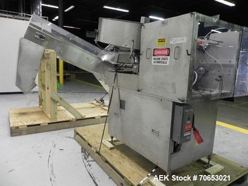 Used New England Model NEHCL-250AJ Bulk Bottle Unscrambler. Has integrated ionized air cleaner. Was last running 45 cc and 60 cc plastic pharmaceutical grade bottles. Includes New England model H/E-1...