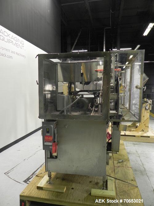 Used New England Model NEHCL-250AJ Bulk Bottle Unscrambler. Has integrated ionized air cleaner. Was last running 45 cc and 60 cc plastic pharmaceutical grade bottles. Includes New England model H/E-1...