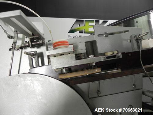 Used New England Model NEHCL-250AJ Bulk Bottle Unscrambler. Has integrated ionized air cleaner. Was last running 45 cc and 60 cc plastic pharmaceutical grade bottles. Includes New England model H/E-1...