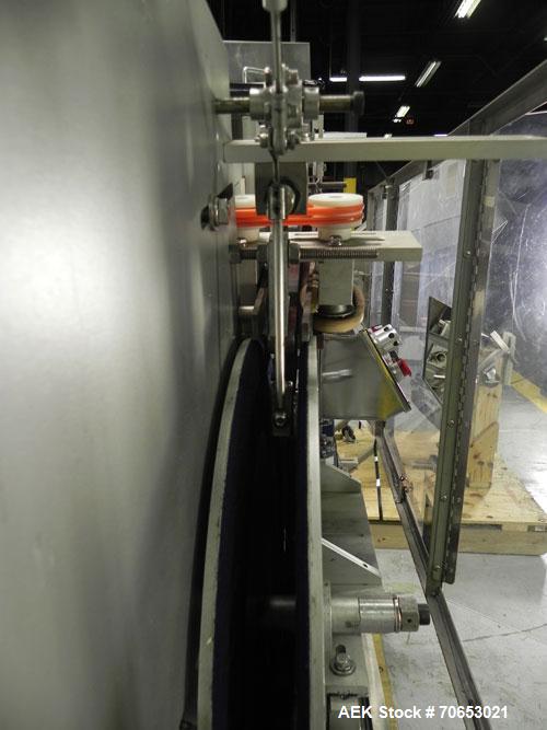 Used New England Model NEHCL-250AJ Bulk Bottle Unscrambler. Has integrated ionized air cleaner. Was last running 45 cc and 60 cc plastic pharmaceutical grade bottles. Includes New England model H/E-1...