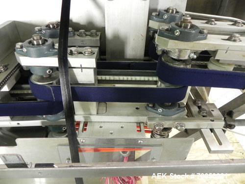 Used New England Model NEHCL-250AJ Bulk Bottle Unscrambler. Has integrated ionized air cleaner. Was last running 45 cc and 60 cc plastic pharmaceutical grade bottles. Includes New England model H/E-1...