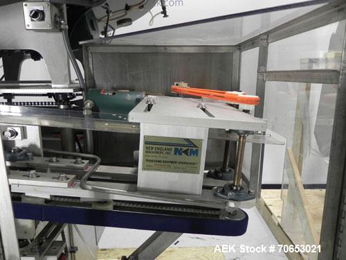 Used New England Model NEHCL-250AJ Bulk Bottle Unscrambler. Has integrated ionized air cleaner. Was last running 45 cc and 60 cc plastic pharmaceutical grade bottles. Includes New England model H/E-1...