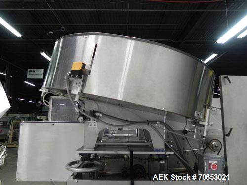 Used New England Model NEHCL-250AJ Bulk Bottle Unscrambler. Has integrated ionized air cleaner. Was last running 45 cc and 60 cc plastic pharmaceutical grade bottles. Includes New England model H/E-1...