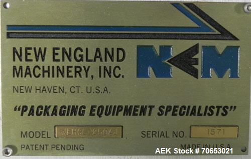 Used New England Model NEHCL-250AJ Bulk Bottle Unscrambler. Has integrated ionized air cleaner. Was last running 45 cc and 60 cc plastic pharmaceutical grade bottles. Includes New England model H/E-1...