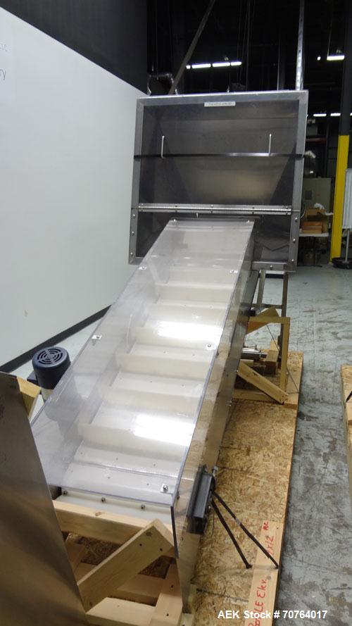 Used New England Machinery Model NEHCL-350 Bulk Bottle Unscrambler. Machine is capable of speeds up to 350 bottles per minute. Has a container size range of 5/8" to 3-1/2" (diameter) with heights up ...