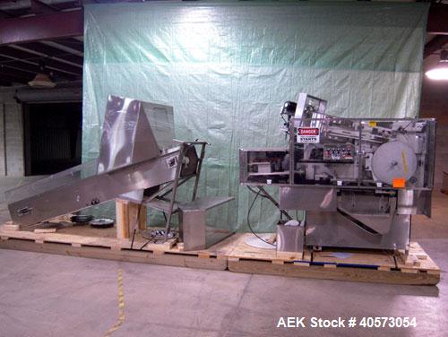 Used New England NECHL350AJ Bulk Plastic Bottle Unscrambler. Includes ionized air cleaner. Has 36" diameter sorting bowl, all stainless steel enclosure, Lexan guarding, bulk bottle elevator. Speeds u...