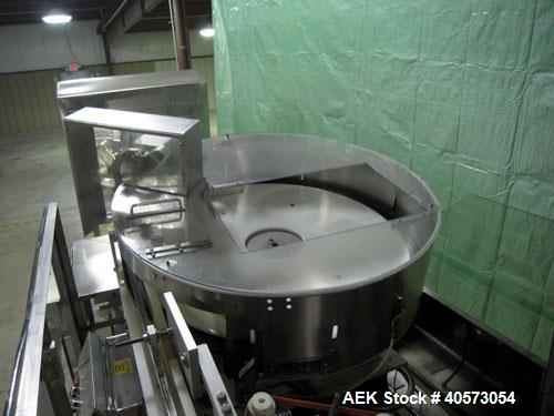 Used New England NECHL350AJ Bulk Plastic Bottle Unscrambler. Includes ionized air cleaner. Has 36" diameter sorting bowl, all stainless steel enclosure, Lexan guarding, bulk bottle elevator. Speeds u...